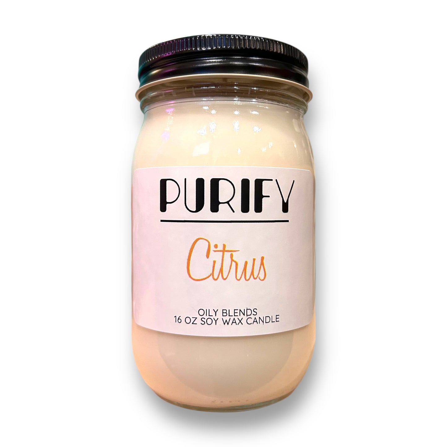A clear jar containing a natural soy wax candle with a label that reads 'Citrus' and 'Purify'.