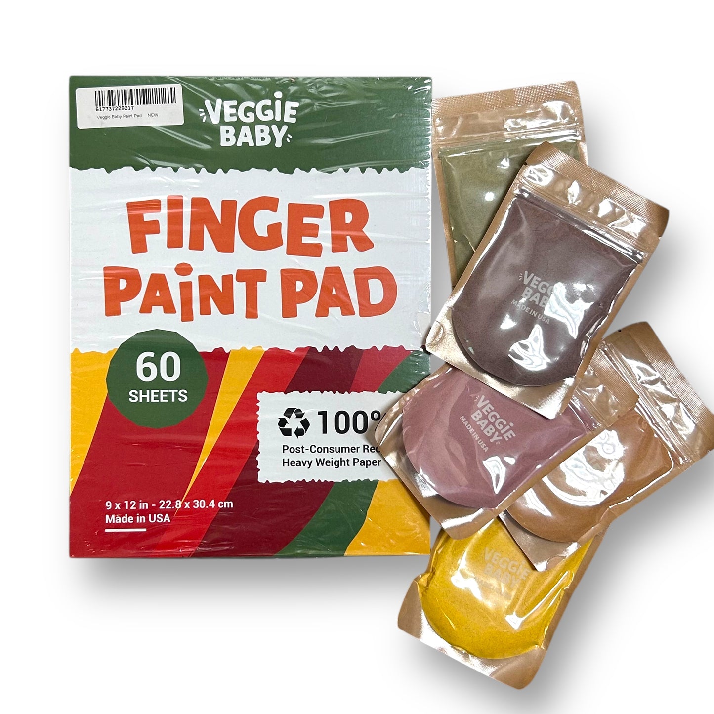 A box of Veggie Baby organic finger paints and art paper pad with multiple packs of finger paint and art paper visible.