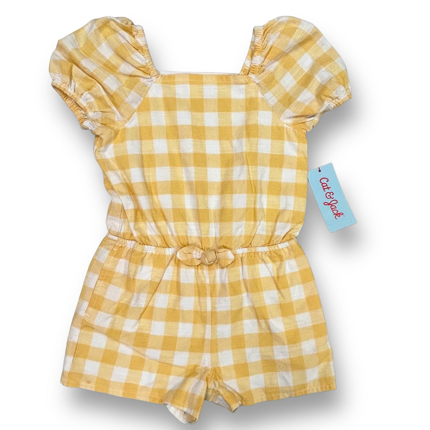A short-sleeved romper for girls, featuring a white and yellow checkered pattern. The romper is displayed on a yellow background with a visible brand tag.