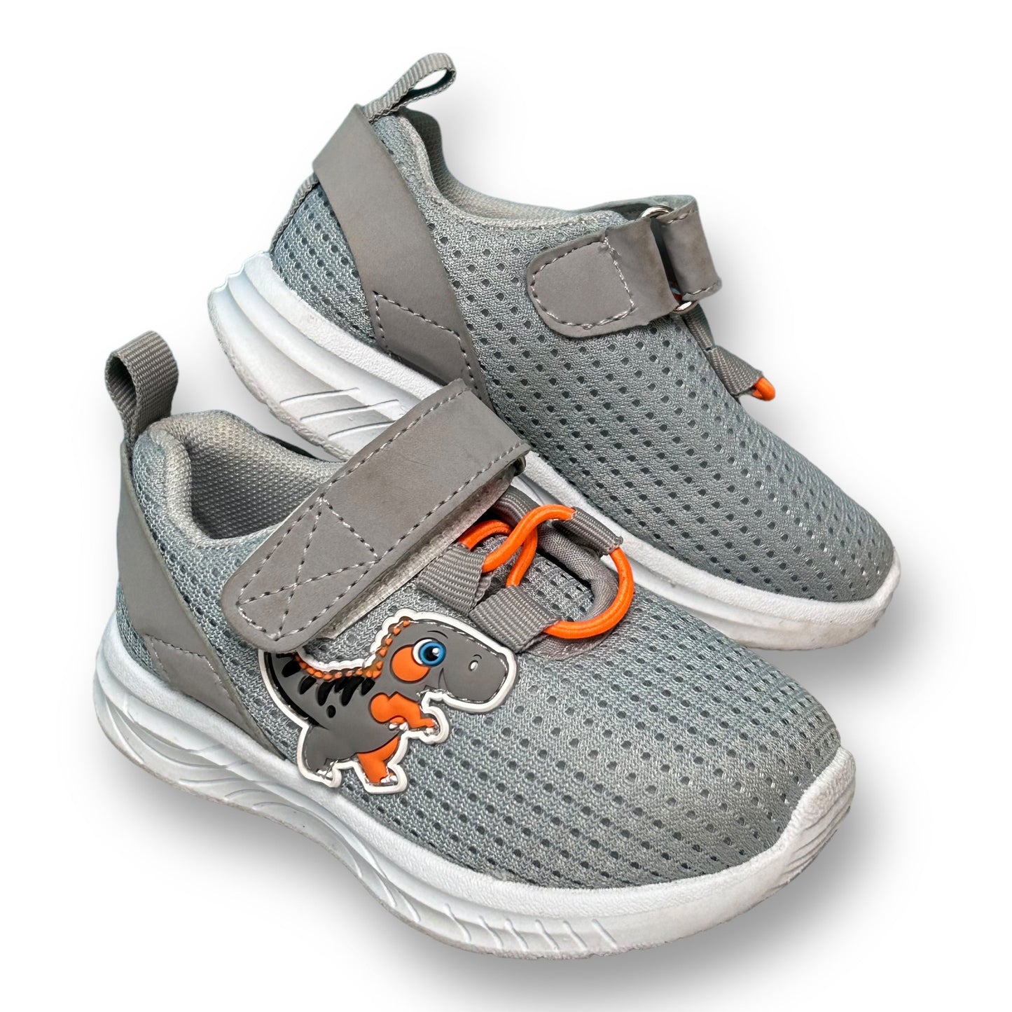 Toddler boy size 5 gray no-tie sneakers with a dinosaur graphic on the side.