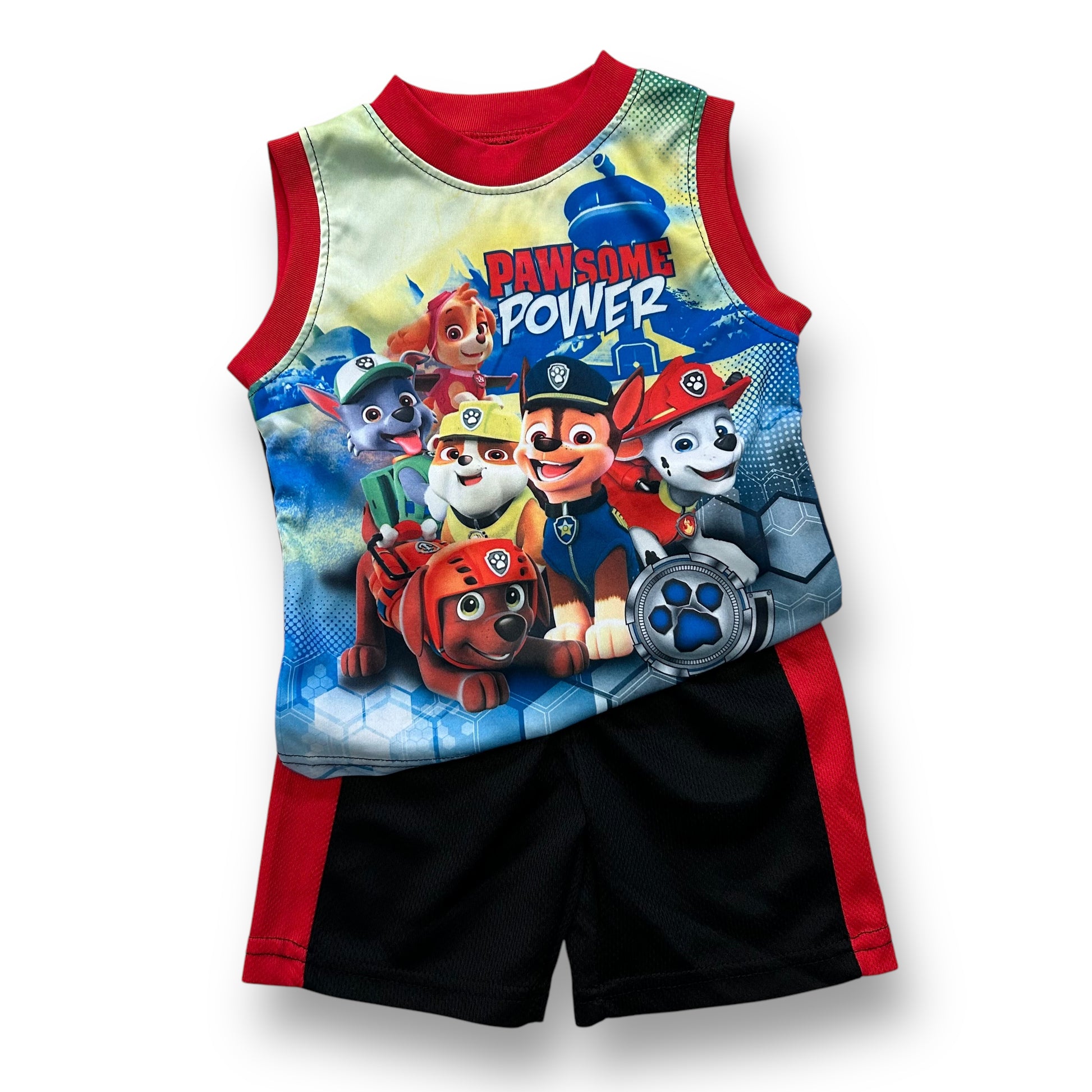A boys' Nickelodeon Paw Patrol outfit featuring a tank top with Paw Patrol characters and a red pair of shorts with the same characters.