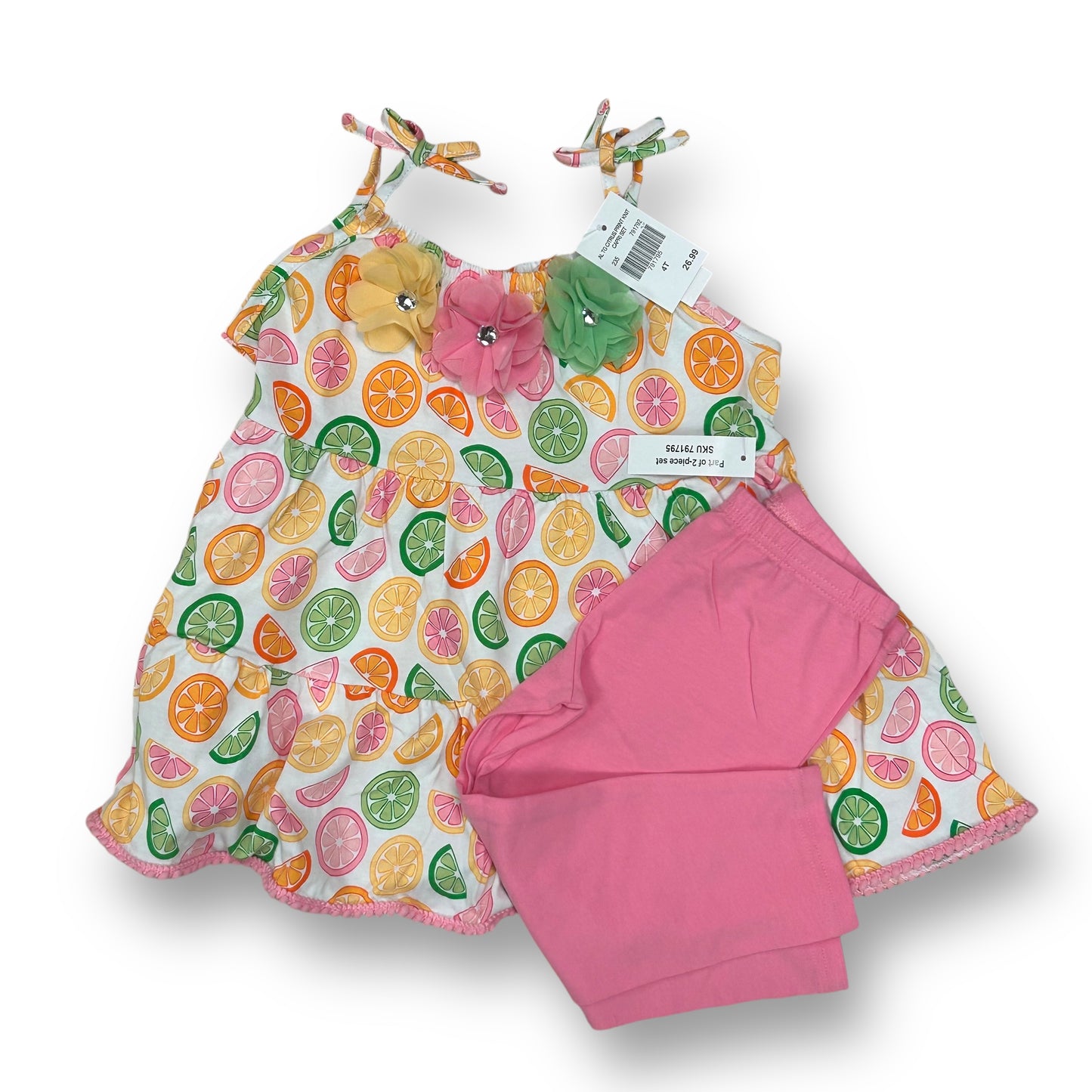 A girls' summer outfit set featuring a spaghetti strap top with citrus fruit prints and a coordinating skirt, both in pink and white colors.