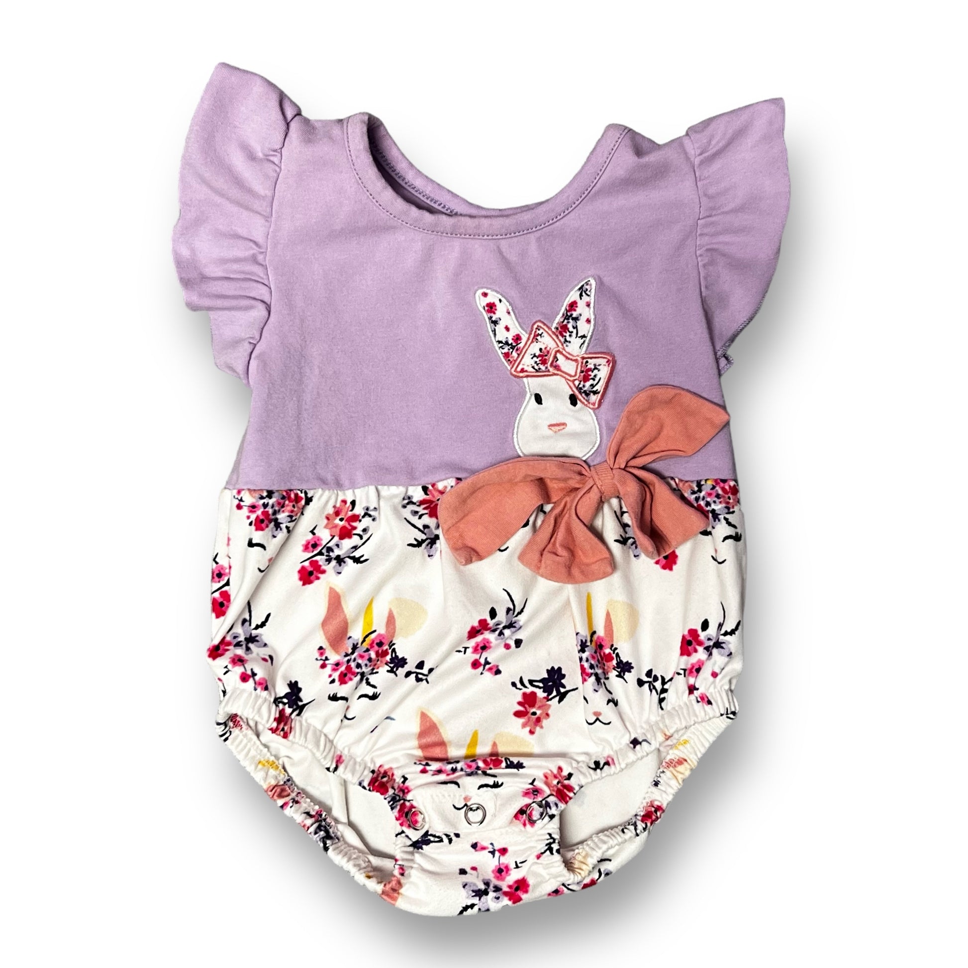 A white and purple floral bunny romper for girls, with a bunny face design on the front.