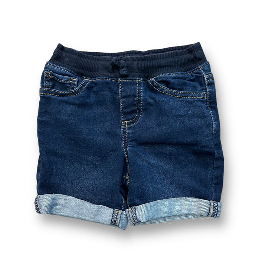 A pair of blue denim elastic waist cuffed shorts for boys.