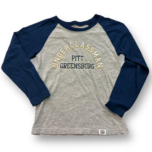 A long sleeve college tee with gray and navy colors, featuring the text 'UNDERCLASSMAN PITT GREENSBURG' on the front.