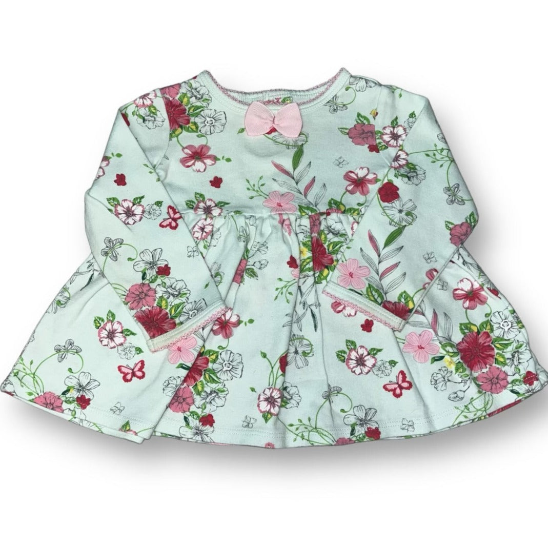 A mint green floral knit dress for girls, with long sleeves and a bow detail.