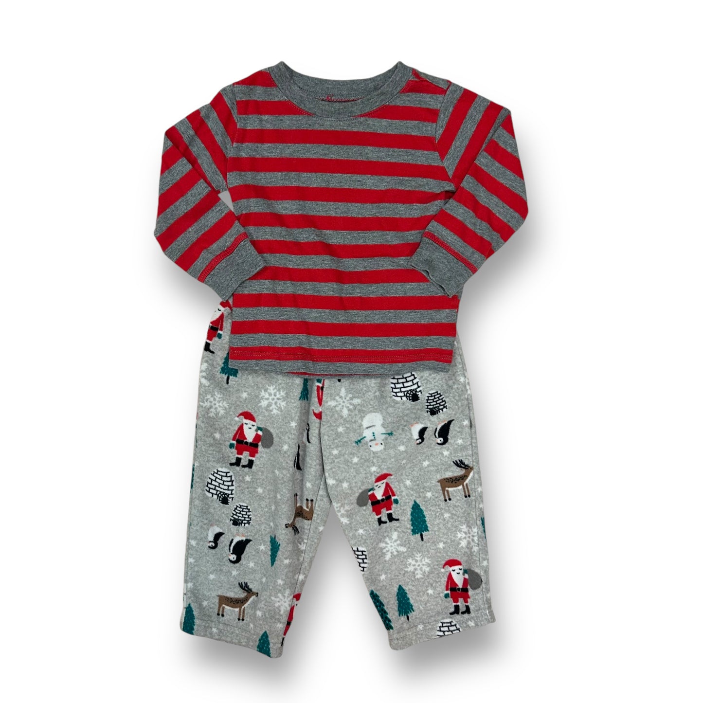 A toddler-sized pair of red and gray striped holiday pajamas with a Christmas themed print on the bottom.