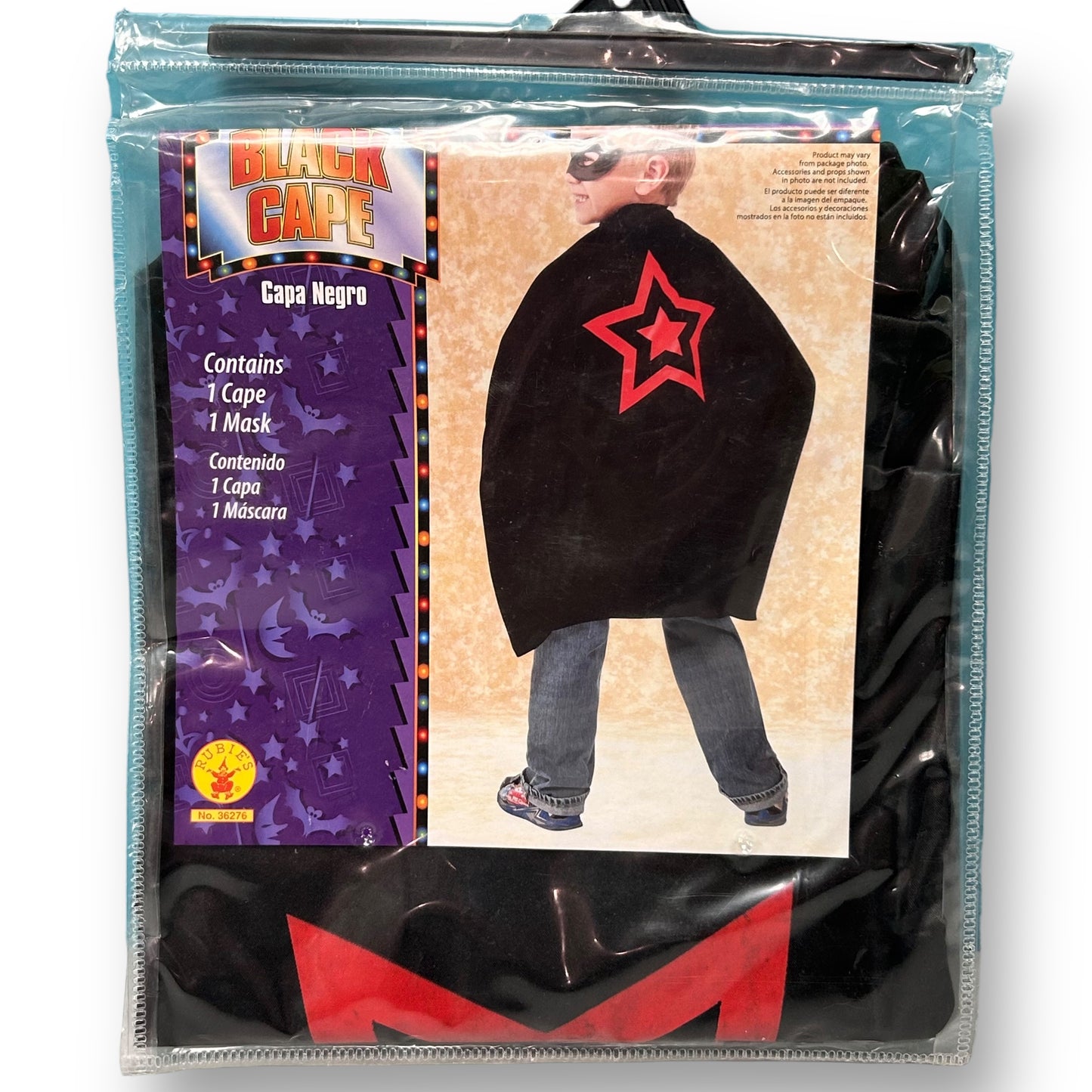 Packaged Rubie's Halloween Black Super Hero Costume Cape with a model wearing the cape in a display window. The cape is black with a red star and the brand's logo.