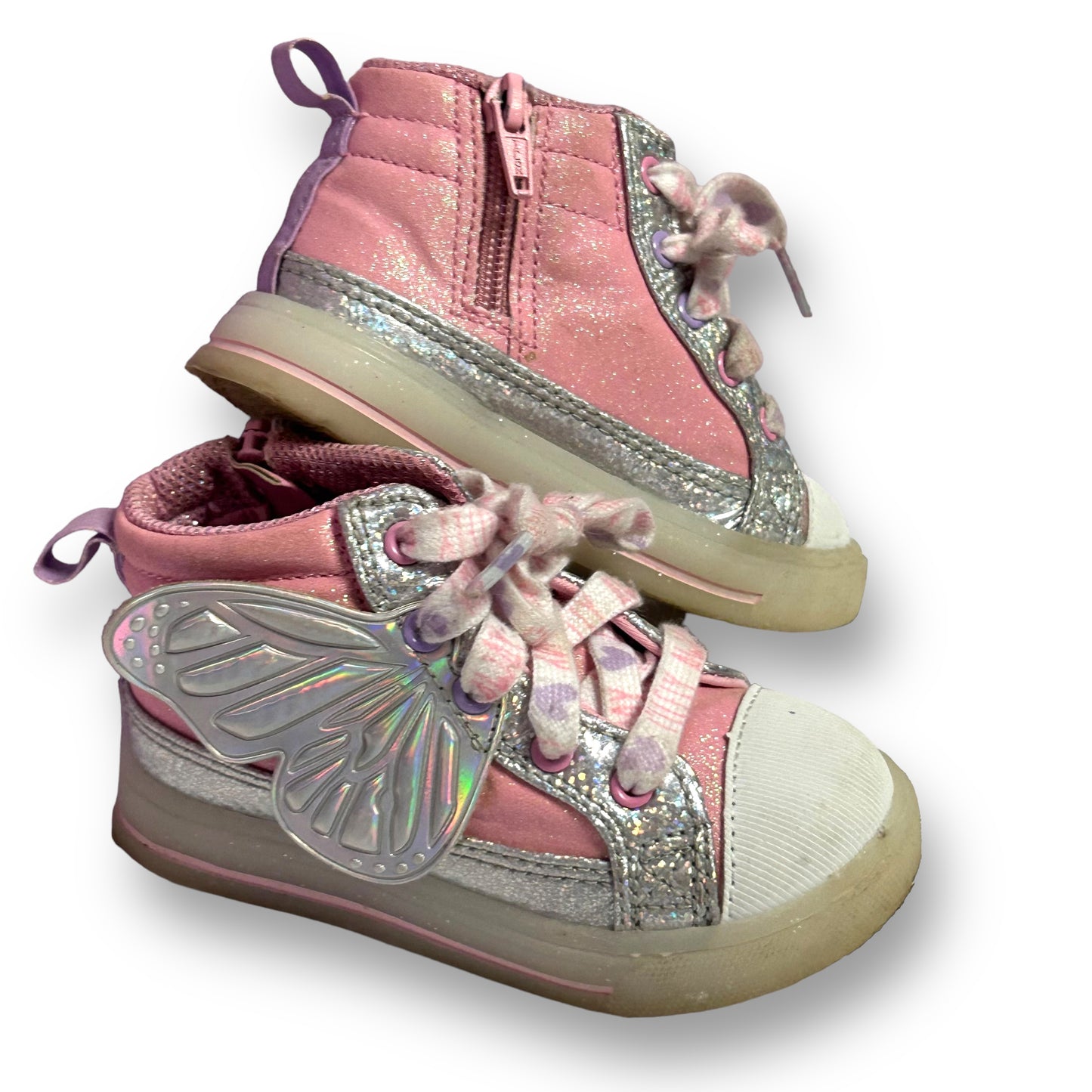 A pair of pink high-top sneakers for toddlers with a butterfly design and light-up features.