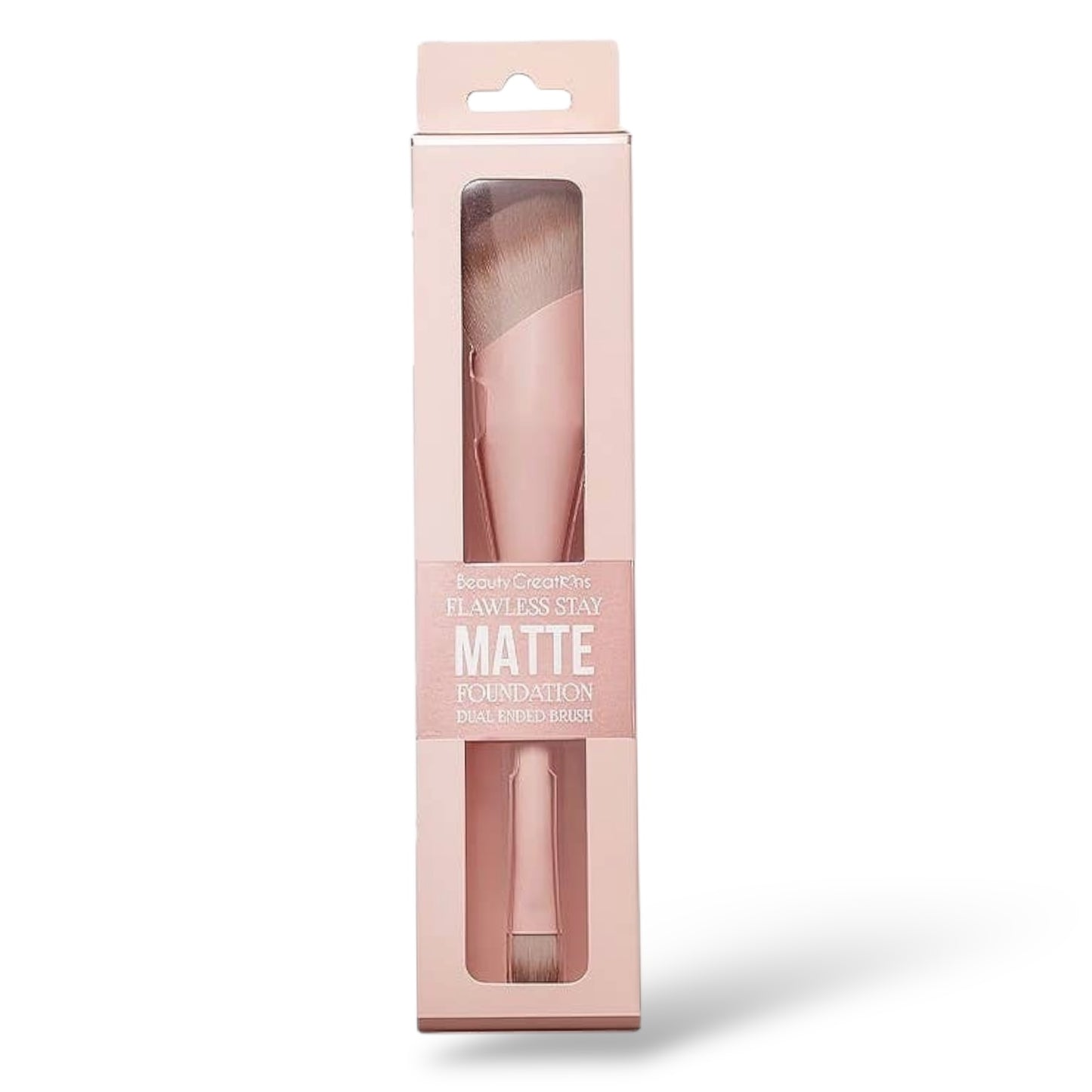 A dual-ended foundation brush with soft synthetic bristles, packaged in a pink and clear box.