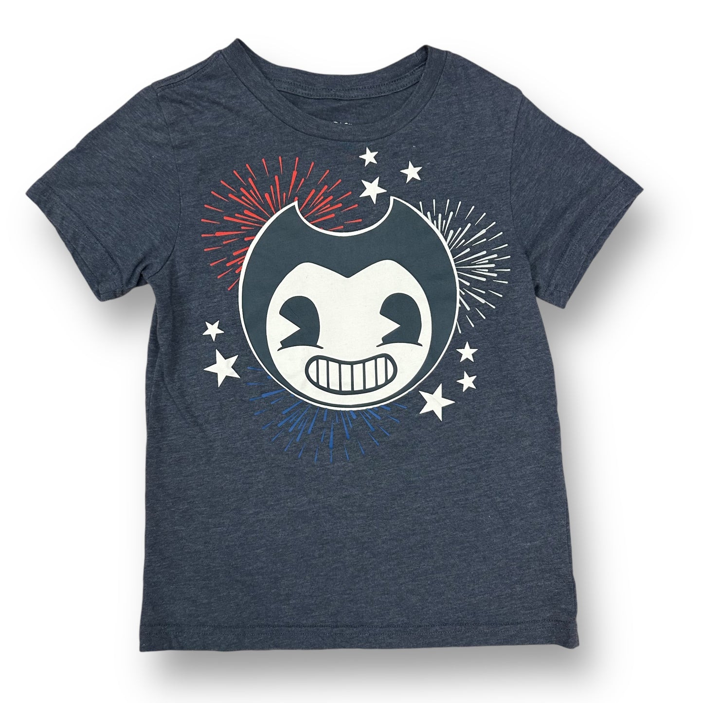 A medium-sized dark blue t-shirt with a graphic print of a character, featuring stars and stripes in red, white, and blue colors.