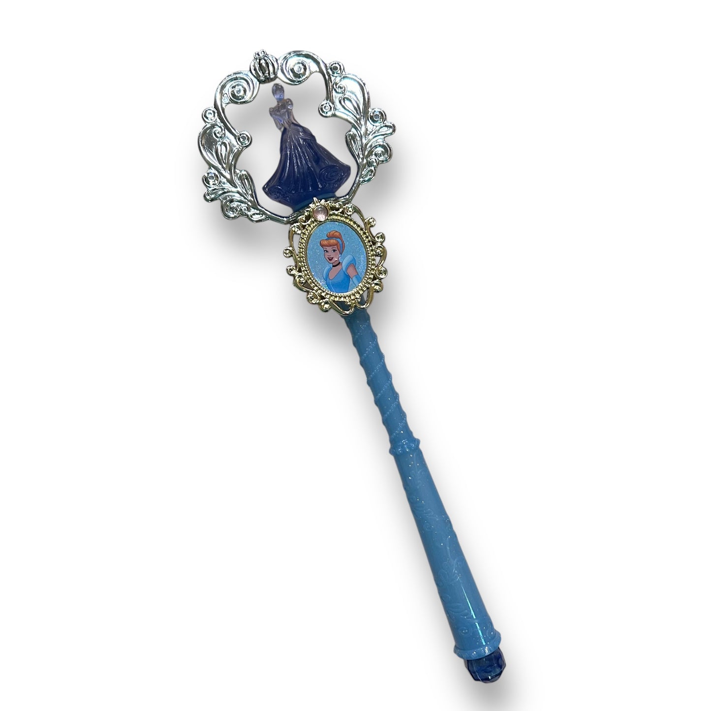 A blue pretend play wand with a Cinderella figure and a silver-colored handle featuring floral details.