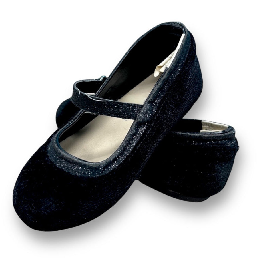 A pair of black velvet toddler girl dress shoes with no buckle, displayed against a white background.