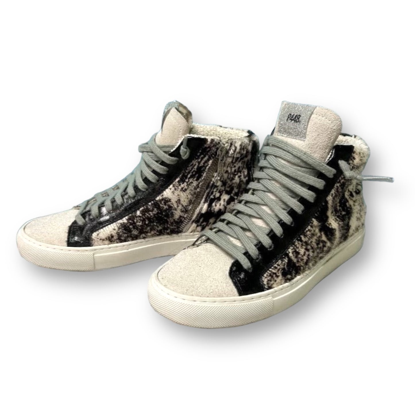Youth girl size 5 high-top sneakers with black and white fur side-zip design, made in Italy.