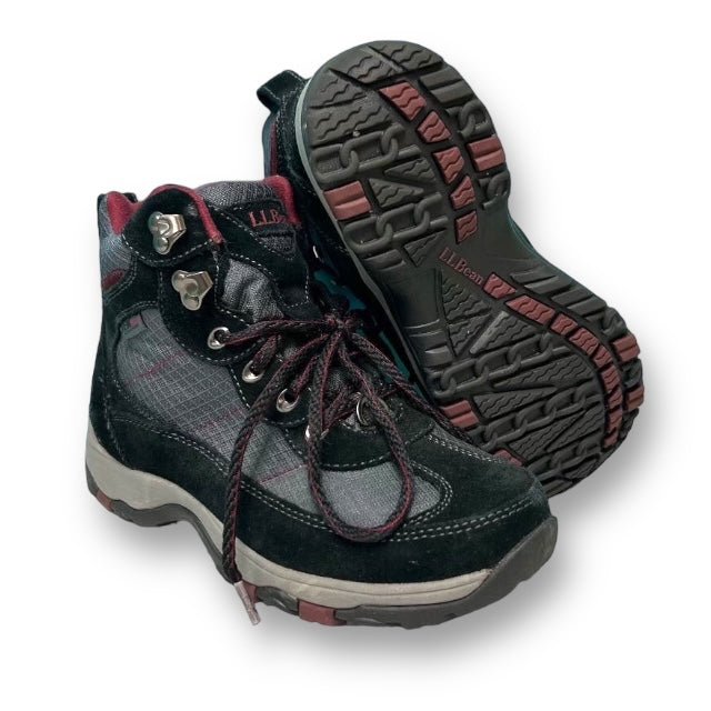 A pair of LL Bean women's hiking boots in black and gray, showing the front and the sole.