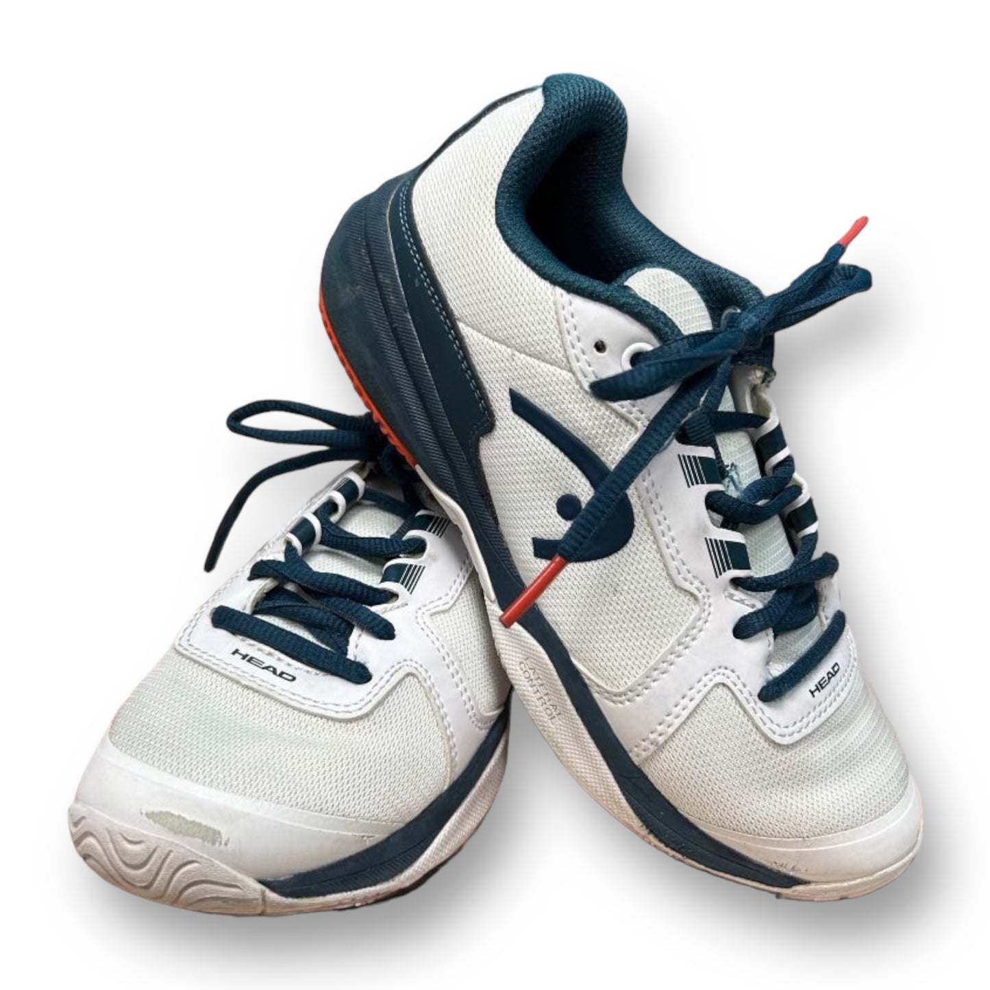A pair of white Head branded tennis shoes with navy blue accents, designed for youth boys' sizes 3.5.