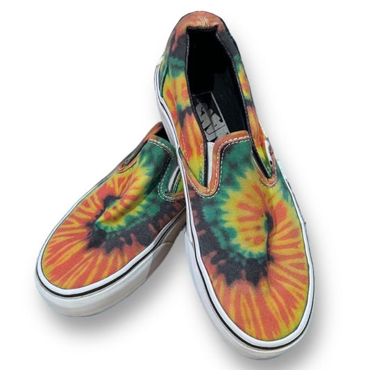 A pair of Vans youth size 4.5 tie-dye slide-on canvas shoes.