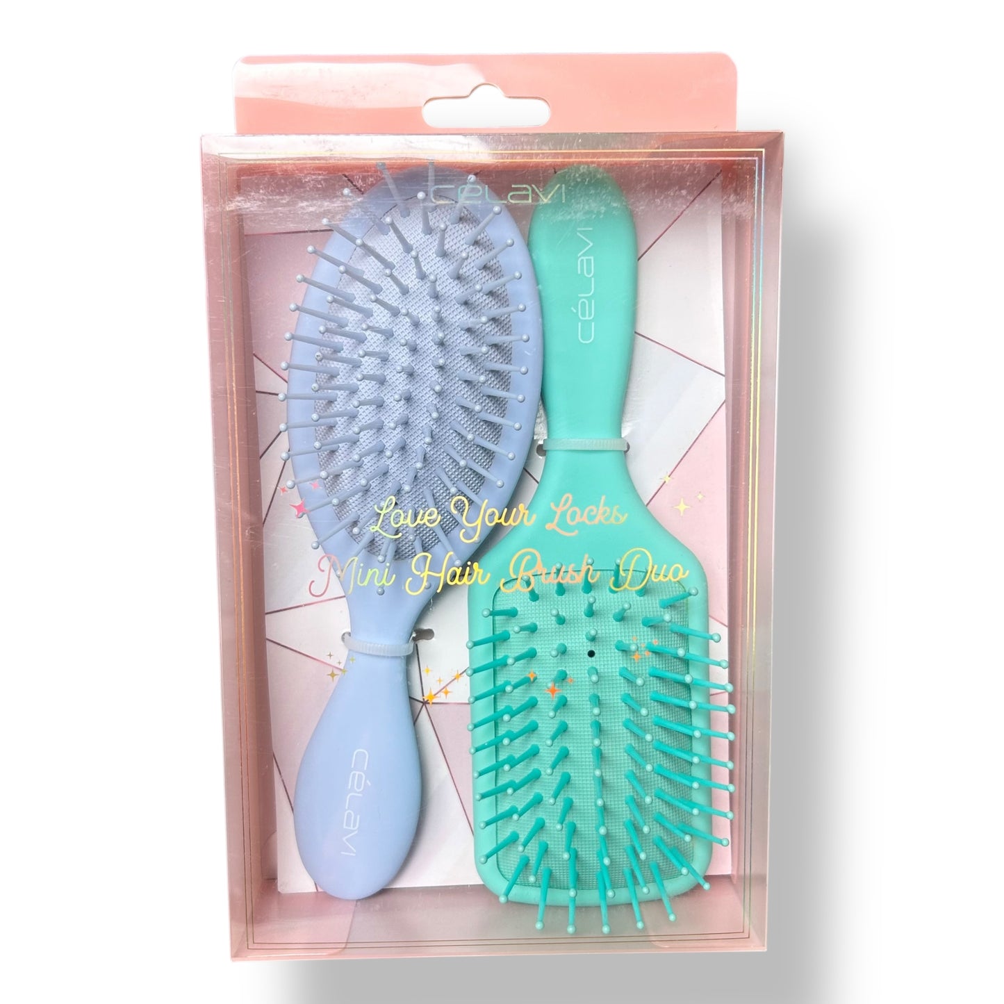 Celavi Love Your Locks Mini Detangling Hair Brush Duo packaged in a pink box, one brush is blue and the other is green.