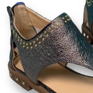 A pair of metallic zipper back sandals for youth girls by Vince Camuto.