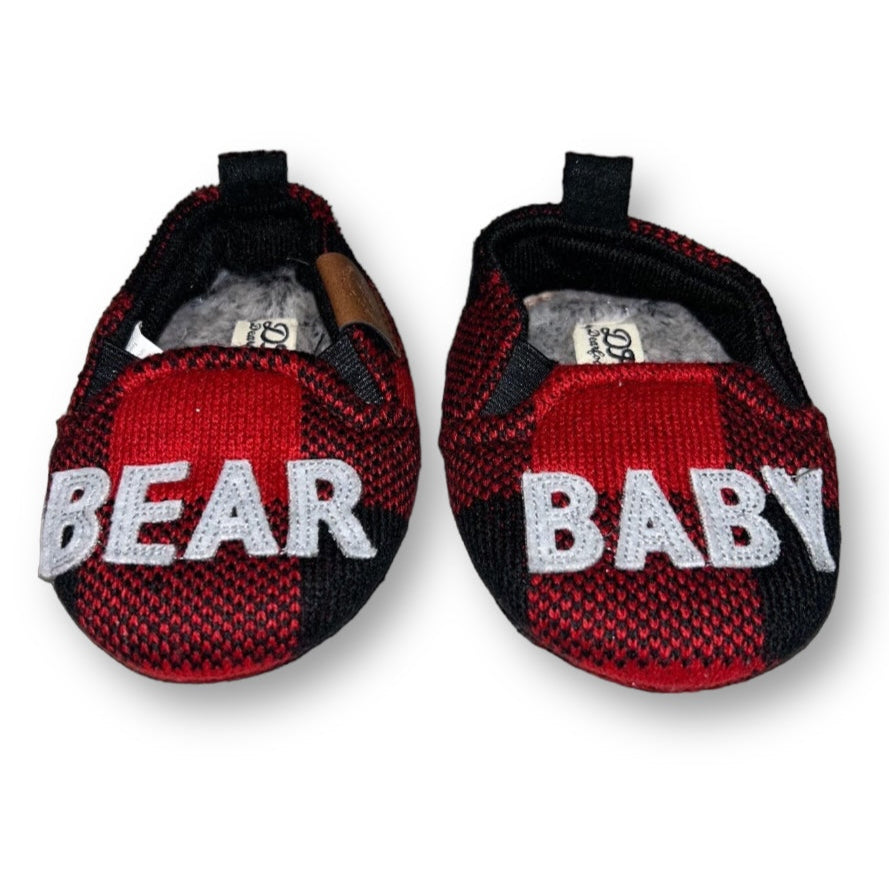 A pair of red and black plaid fur-lined baby boy slippers with the text 'BEAR BABY' on the top.