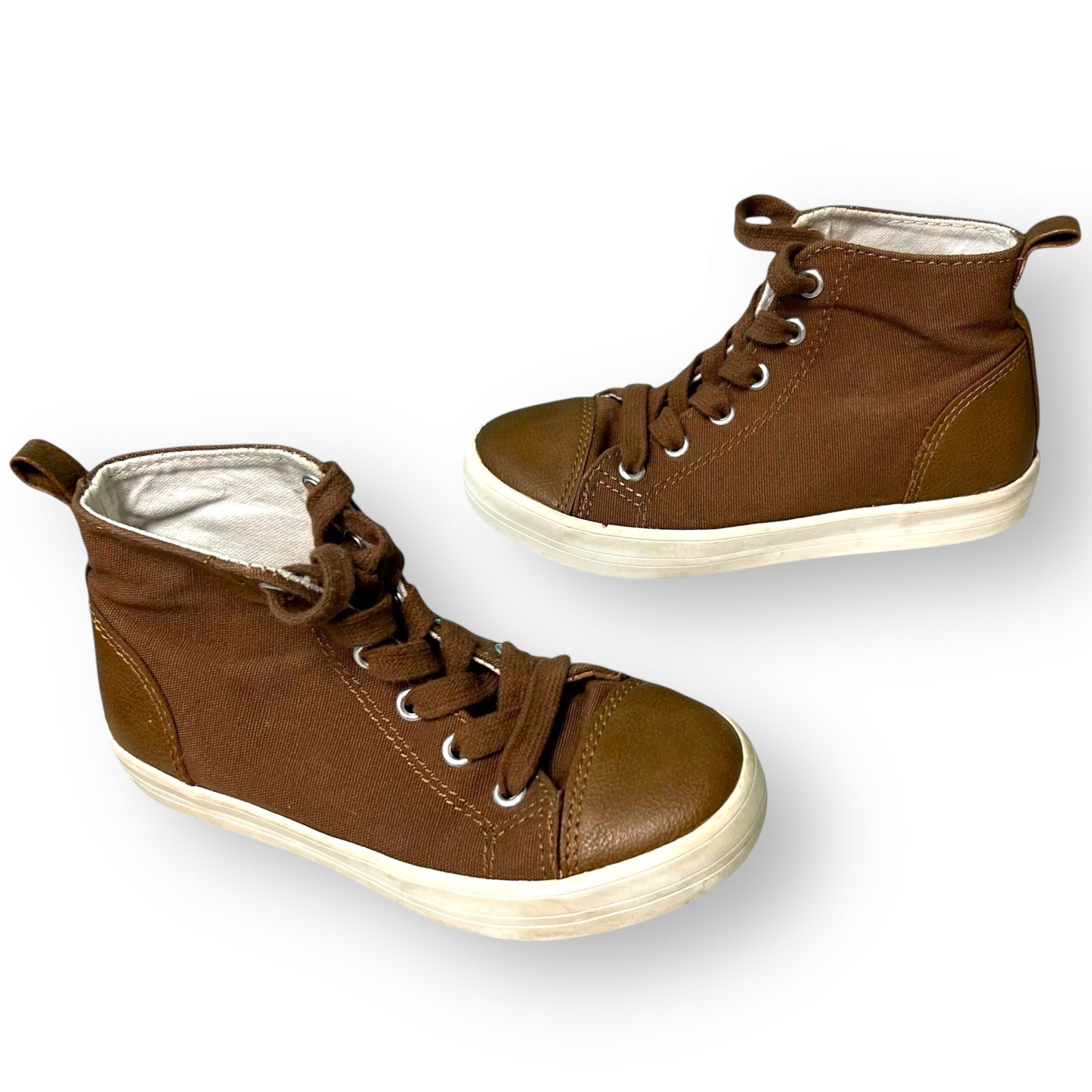 Pair of brown high-top sneakers on a white background