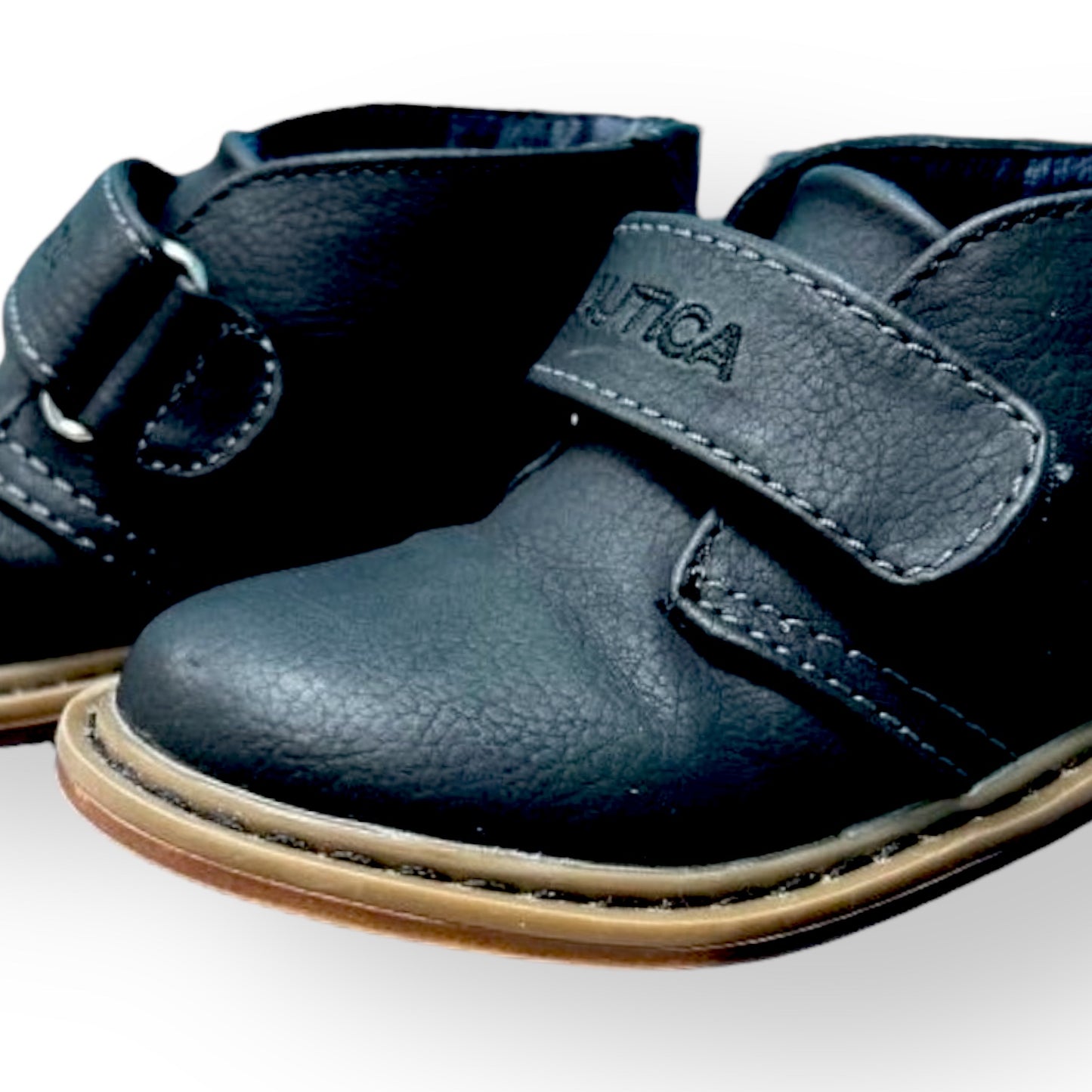 Nautica children's shoes with velcro straps on a white background