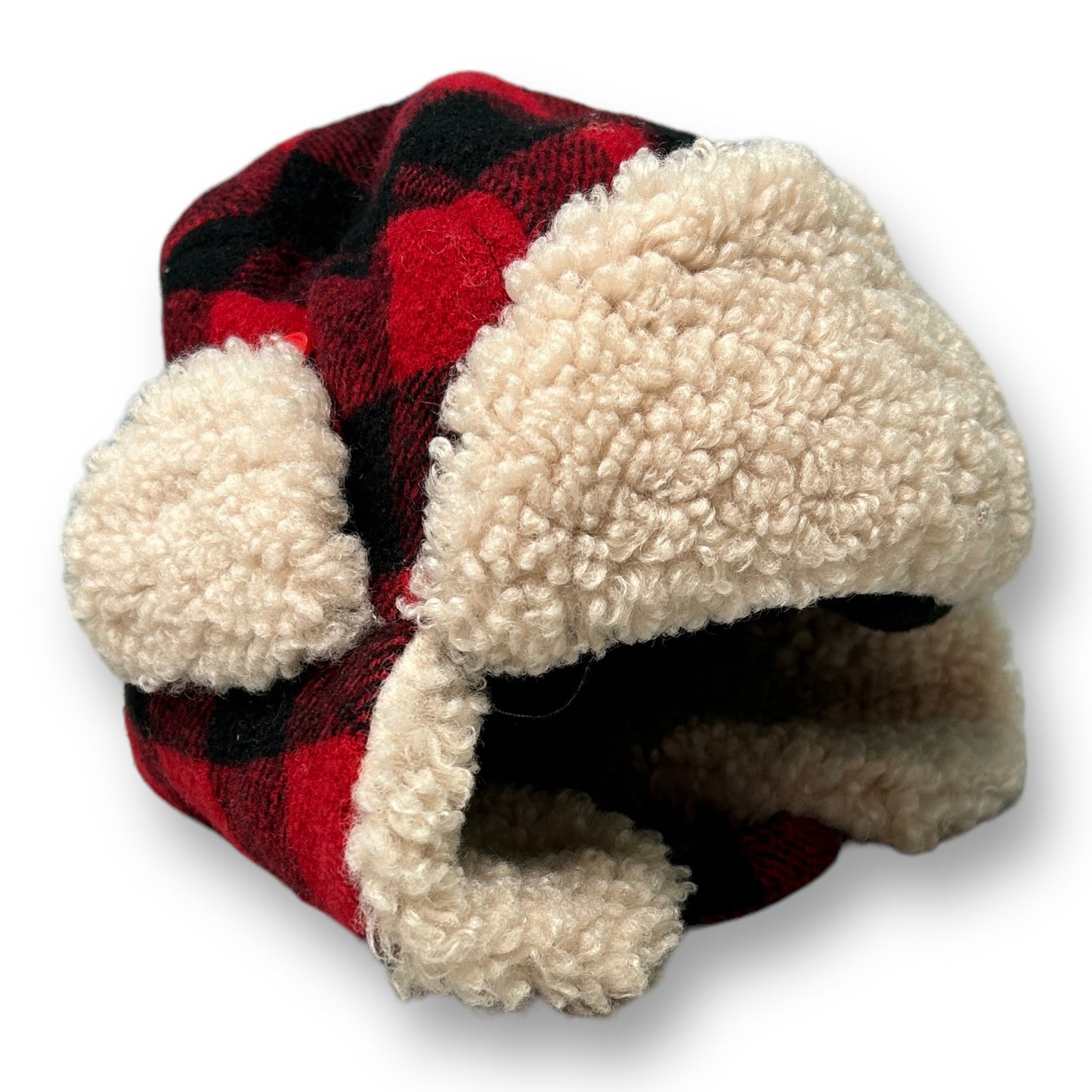 Toddler boy's Sherpa lined black and red plaid hat with a beige brim.