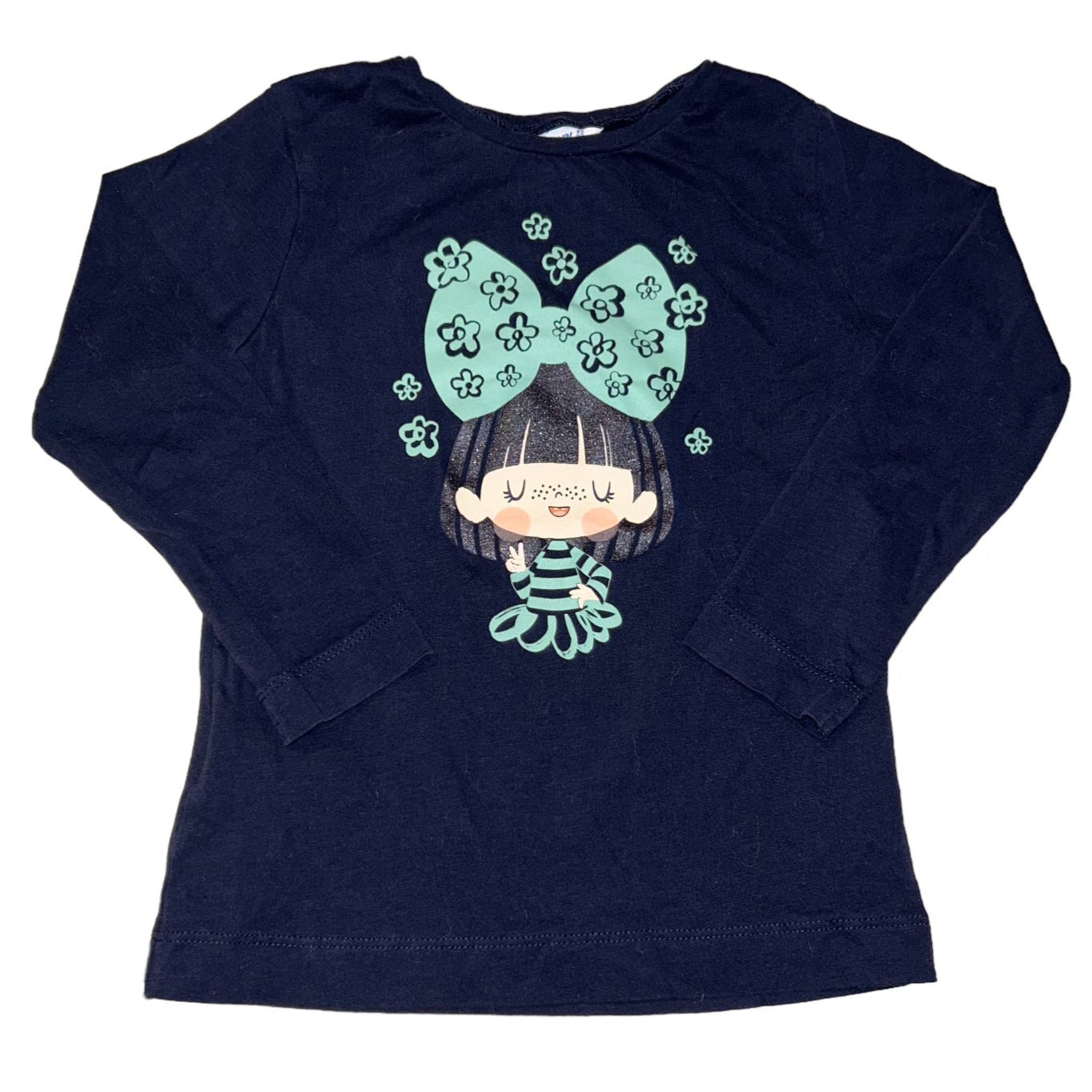 A dark blue long sleeve character shirt for girls, featuring a cartoon character with a bow and flowers on the front.