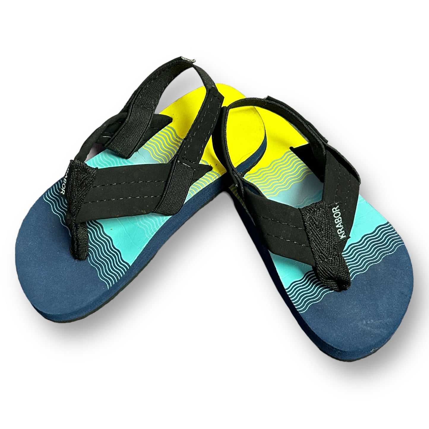 A pair of toddler boy size 5/6 adjustable fit thong sandals with blue and yellow straps and a black thong.
