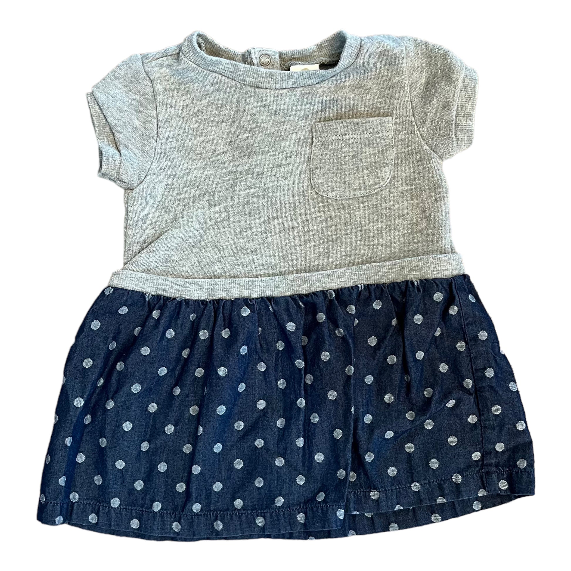 A 9 month old girl's blue and gray ruffle dress with long sleeves and a round neckline.