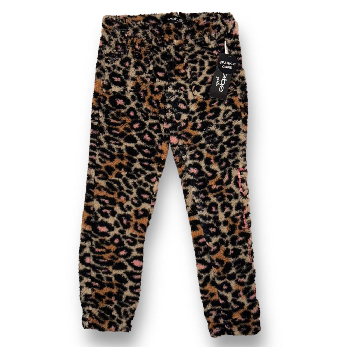 Girls' brown animal print pants with a leopard spots pattern.