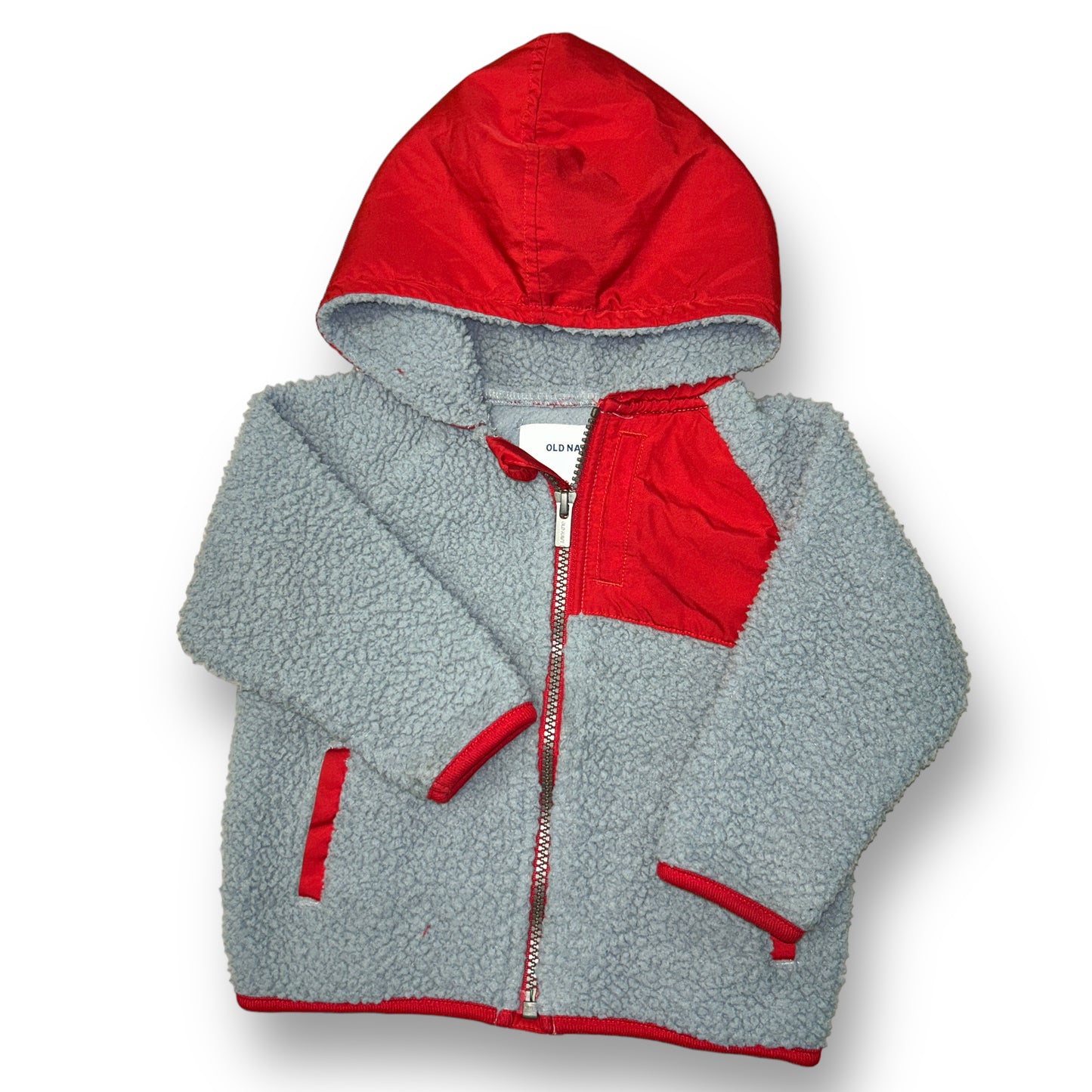 A gray and red zippered sherpa jacket for boys, displayed on a mannequin.