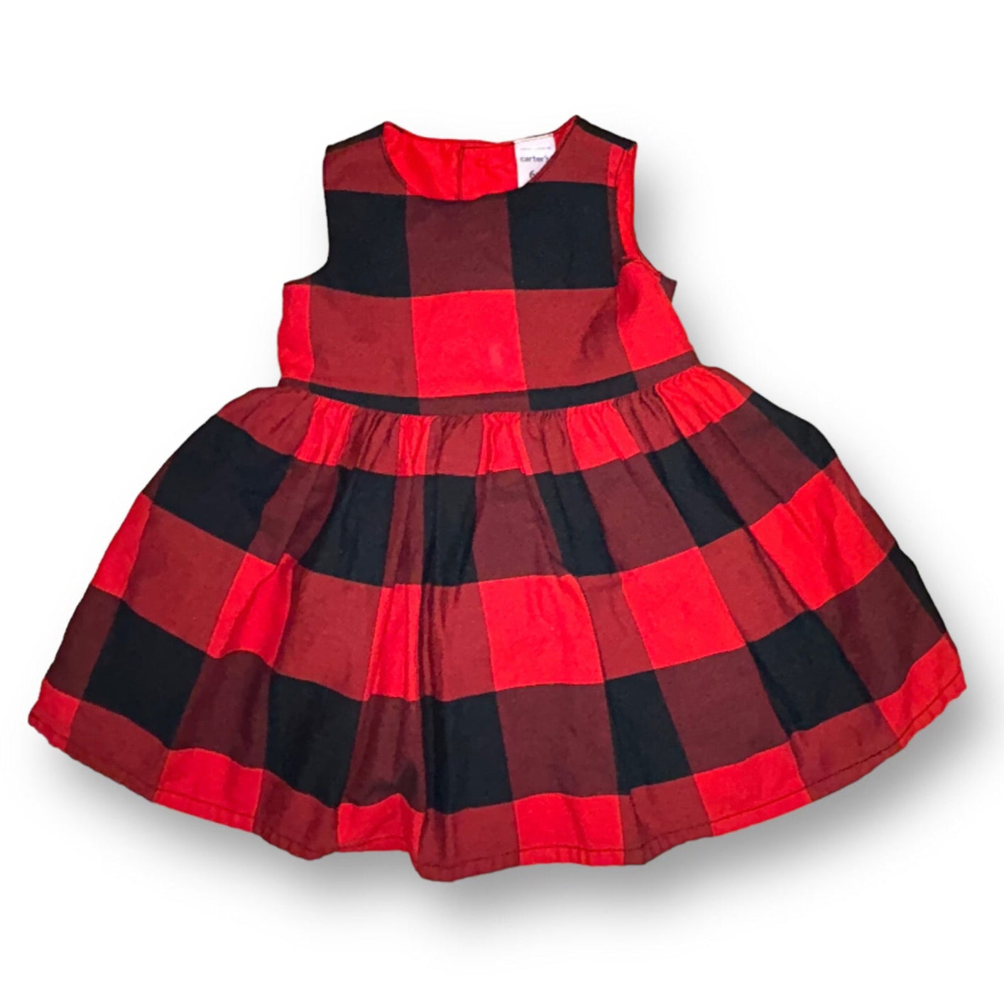 A red and black plaid tie-back sleeveless dress for a 6 month old girl by Carter's.