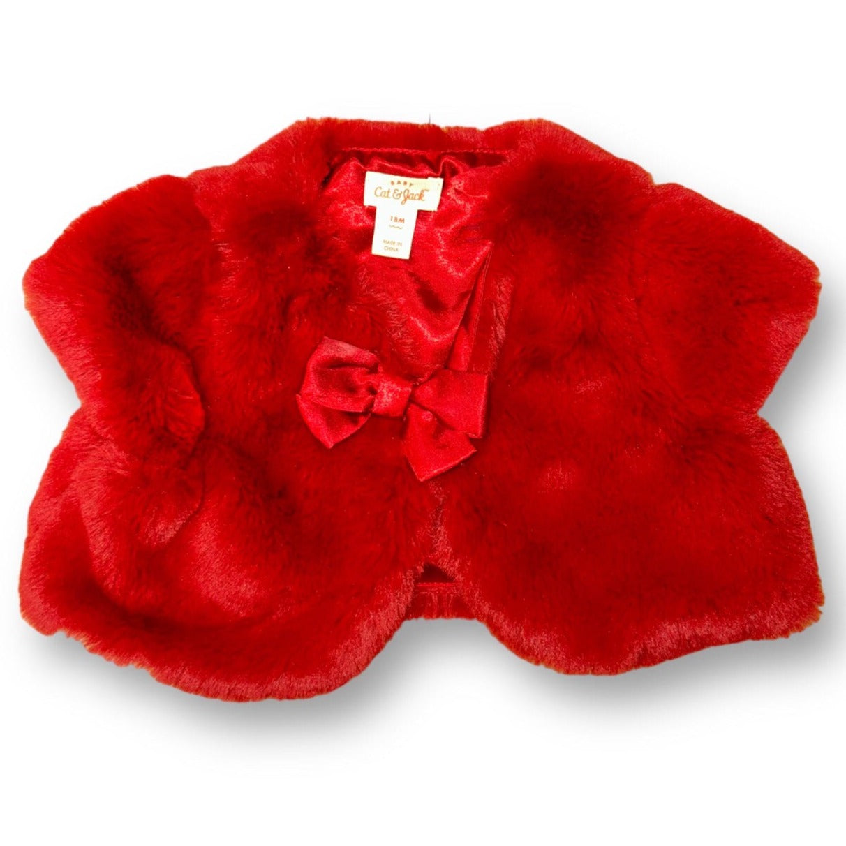 Red faux fur jacket shrug for girls with a bow detail, displayed on a white background.