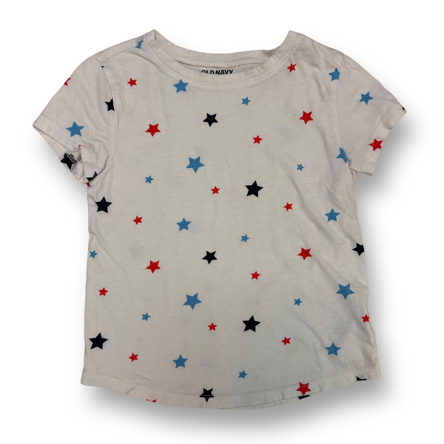 A girls' t-shirt with red, white, and blue stars pattern, suitable for 4th of July celebration.