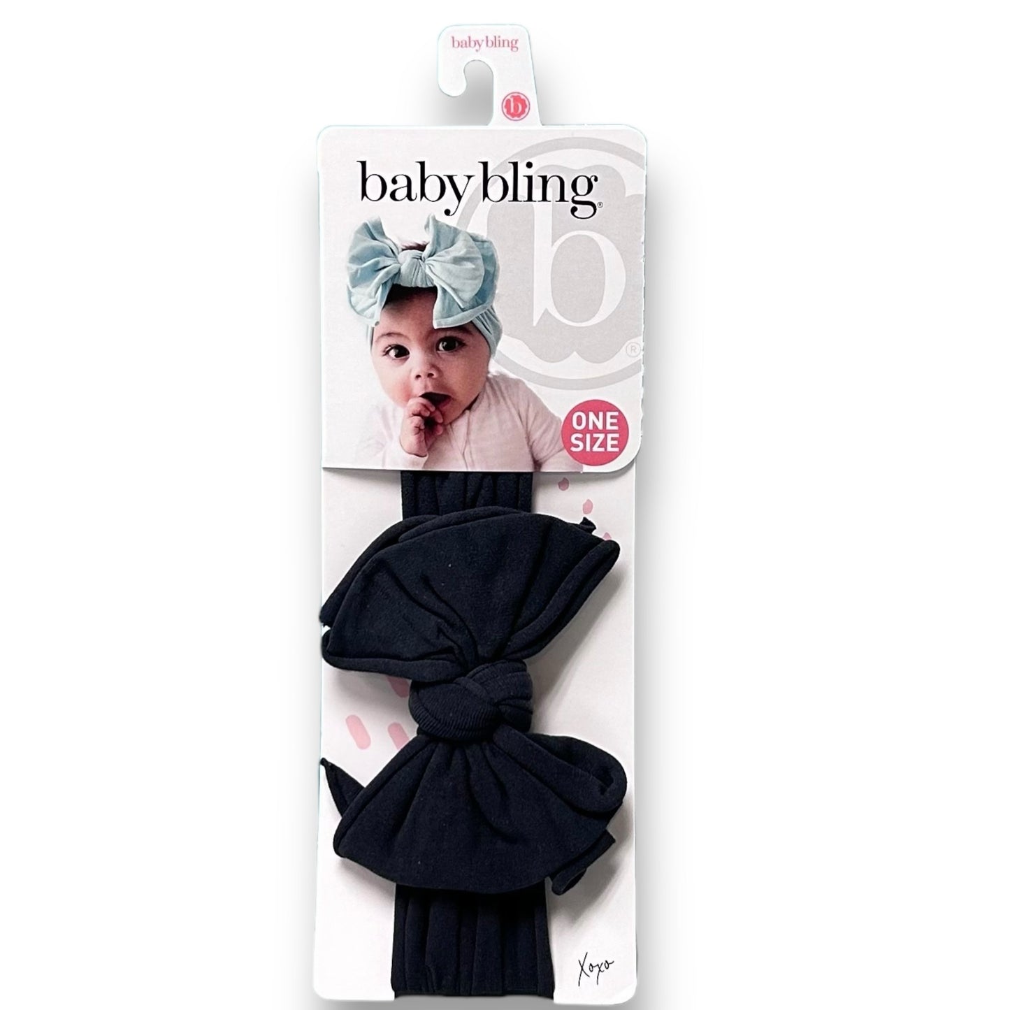 Packaged dark gray knotted bow headband for girls, displayed on a retail card with the brand 'Baby Bling' visible.