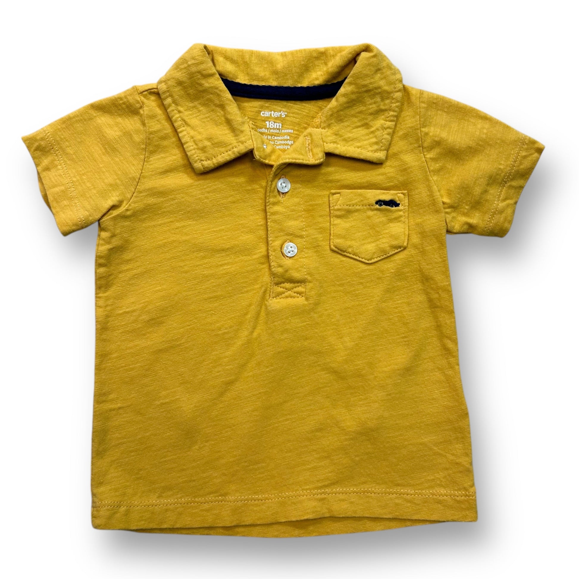 A yellow short sleeve pocket polo shirt for a baby boy.