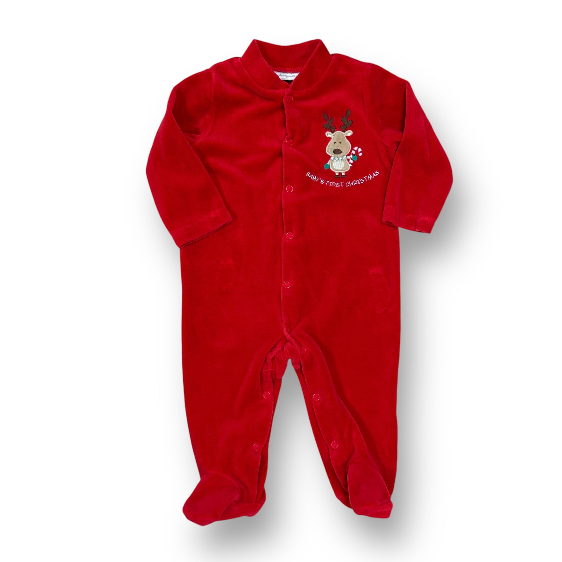 A red velour footie sleeper for boys, featuring a Christmas themed design with a reindeer and text 'Santa's Workshop'.