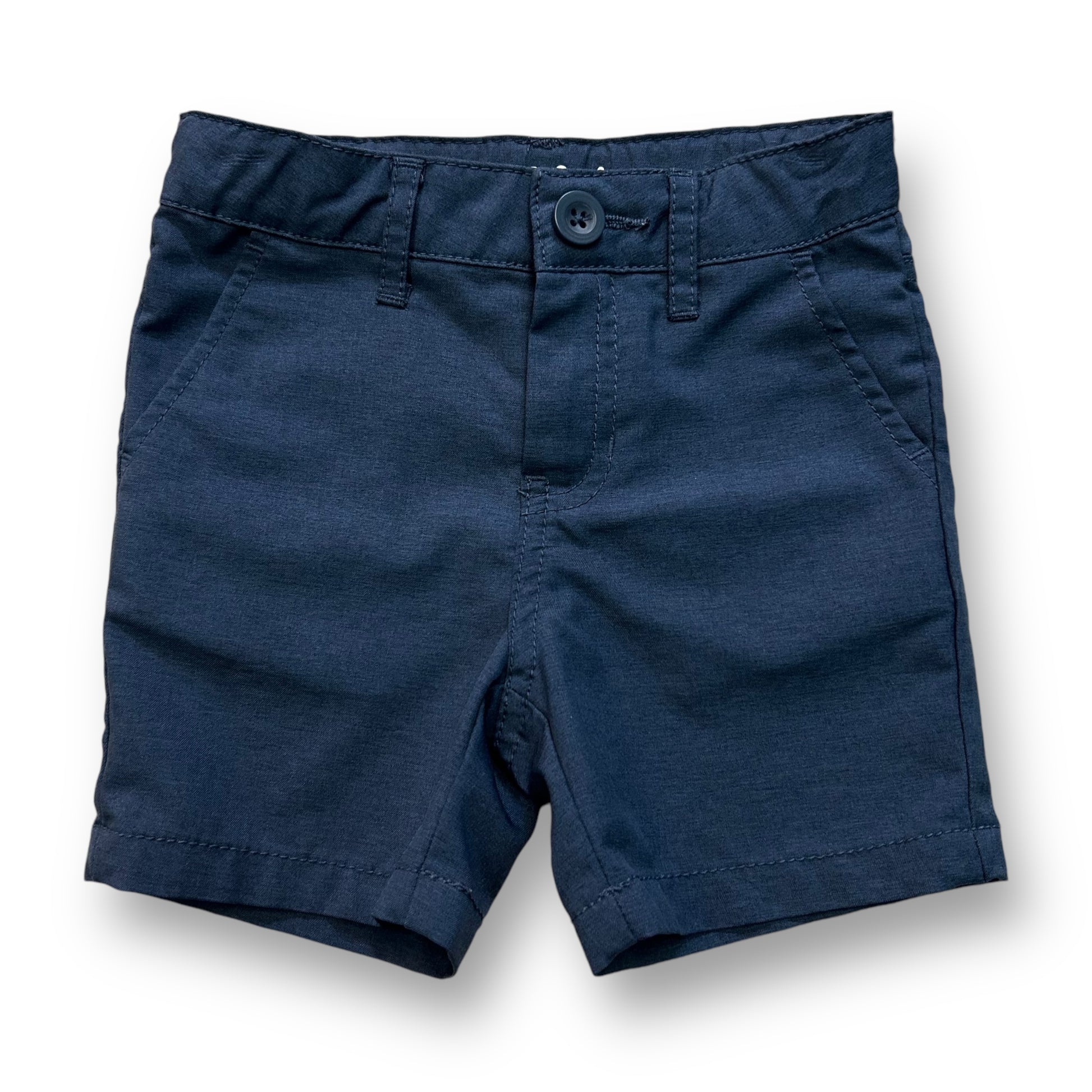 A pair of navy blue adjustable fit shorts for boys.