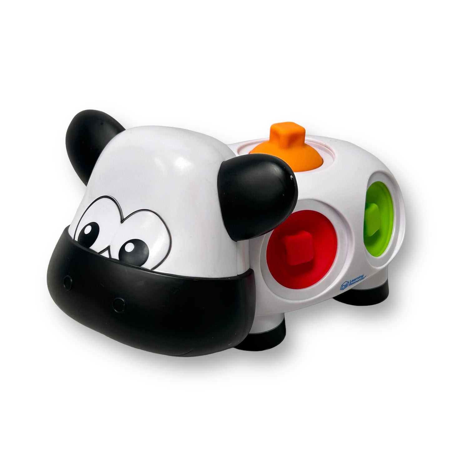 A plastic toy resembling a cow with a combination lock and colorful buttons on its side, designed for educational play.