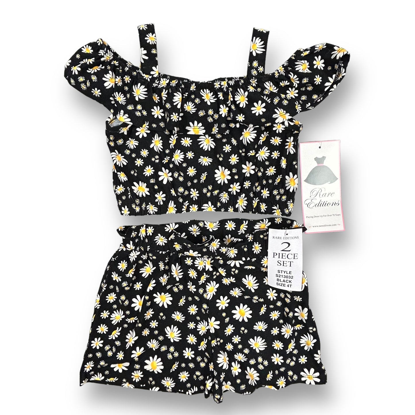 A black and white daisy-patterned 2-piece outfit for girls, displayed on a hanger with the brand tag visible.