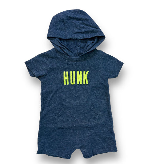 A dark blue hooded snap bottom one-piece for boys, with the word 'HUNK' printed in green on the front.