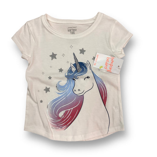 A white short-sleeved girls' t-shirt with a shimmering unicorn design, featuring stars and a pink, blue, and red horn.