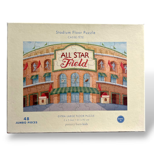 Box of 'All Star Field' stadium floor puzzle with illustration of a building facade.