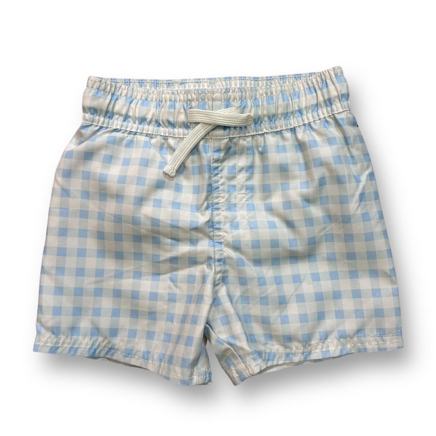 A pair of baby blue checkered swim trunks for boys.