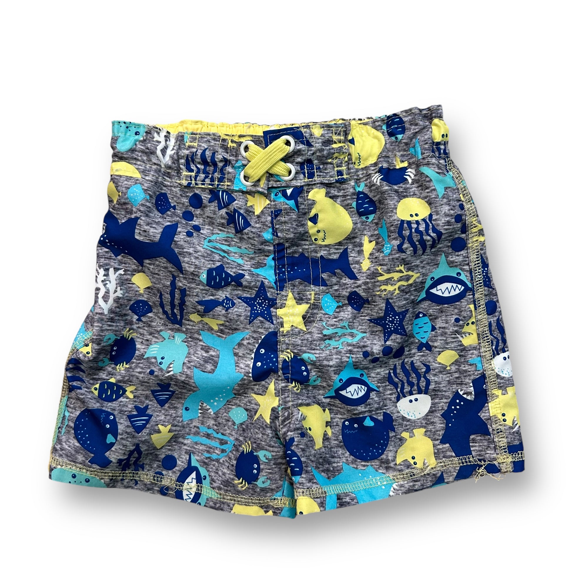 Toddler boys' swim trunks with a gray and blue color scheme and a pattern of tropical fish.