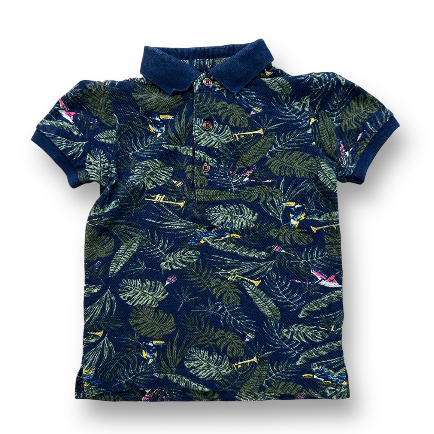 A navy-colored polo shirt with a tropical print, featuring short sleeves and a collar.