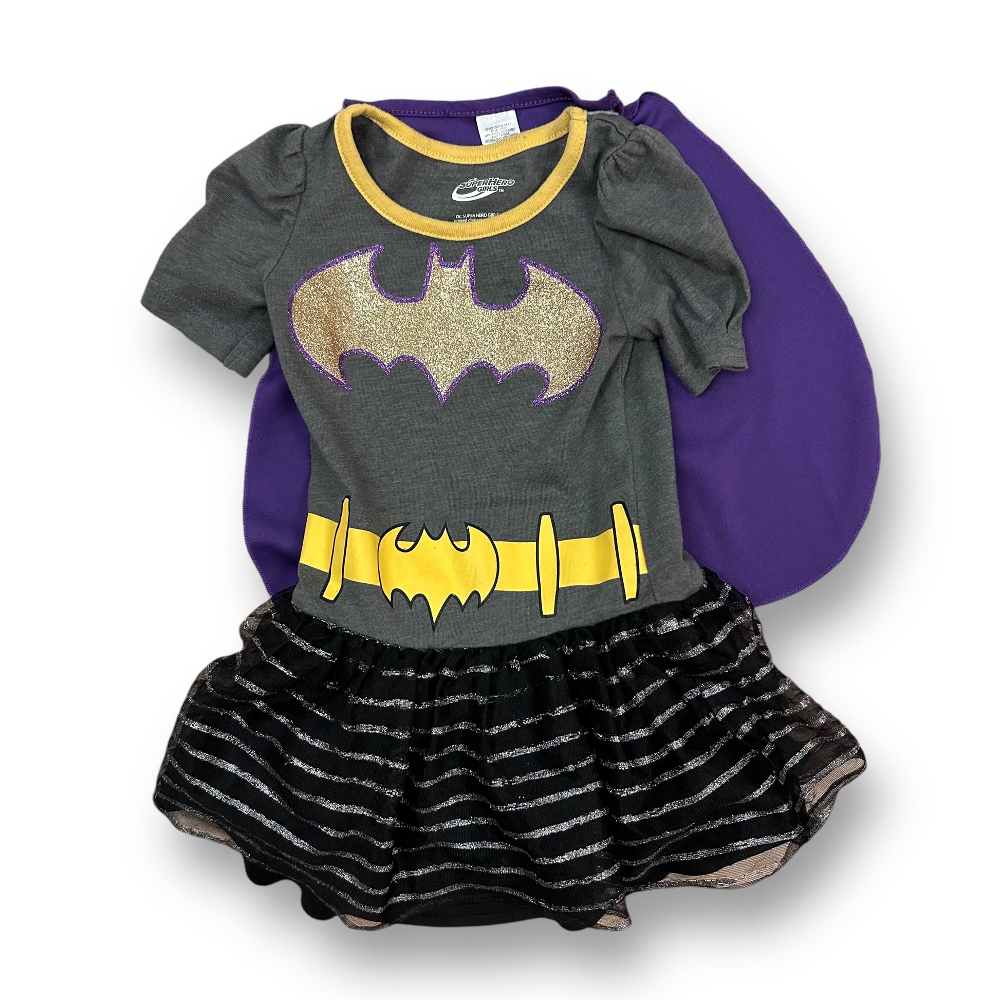 A 2T girls' dress and cape set featuring a gray shirt with a yellow belt and a purple cape with a Batgirl design.