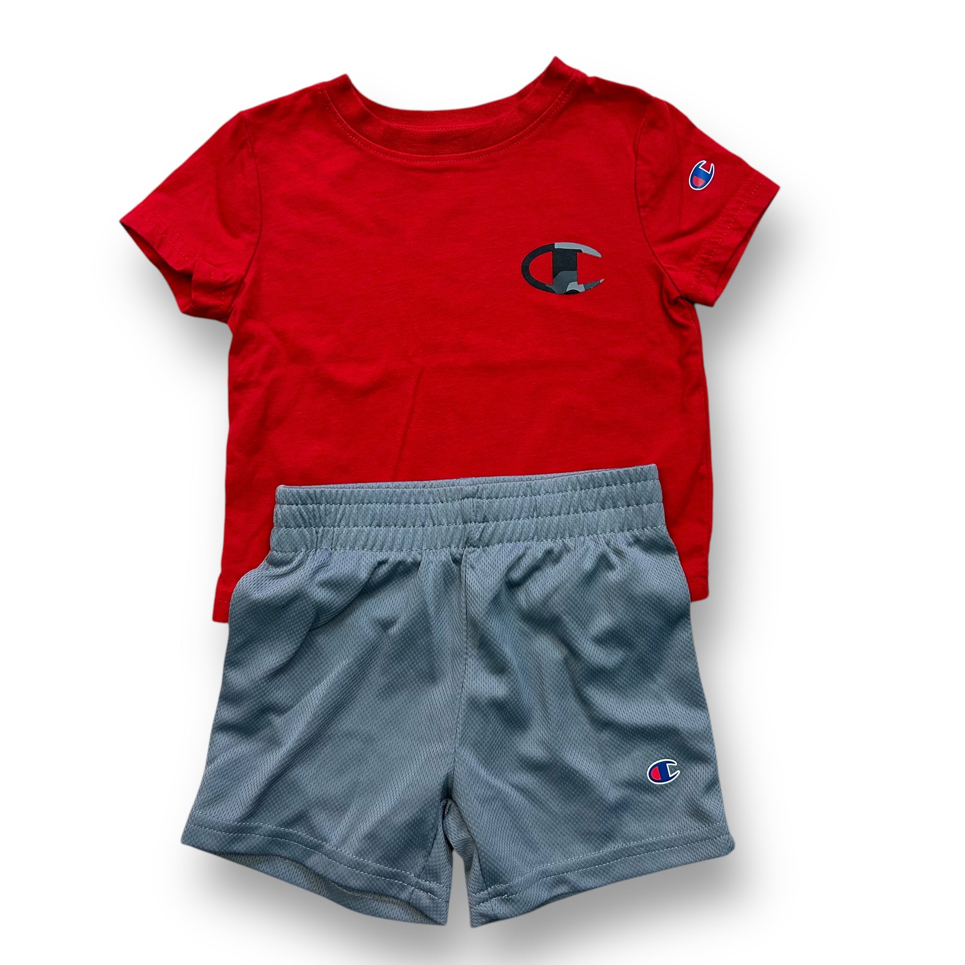 A red and gray athletic tee and shorts set for a toddler.