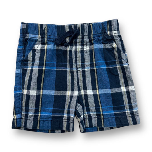 A pair of blue plaid pull-on shorts for 18 month old boys.